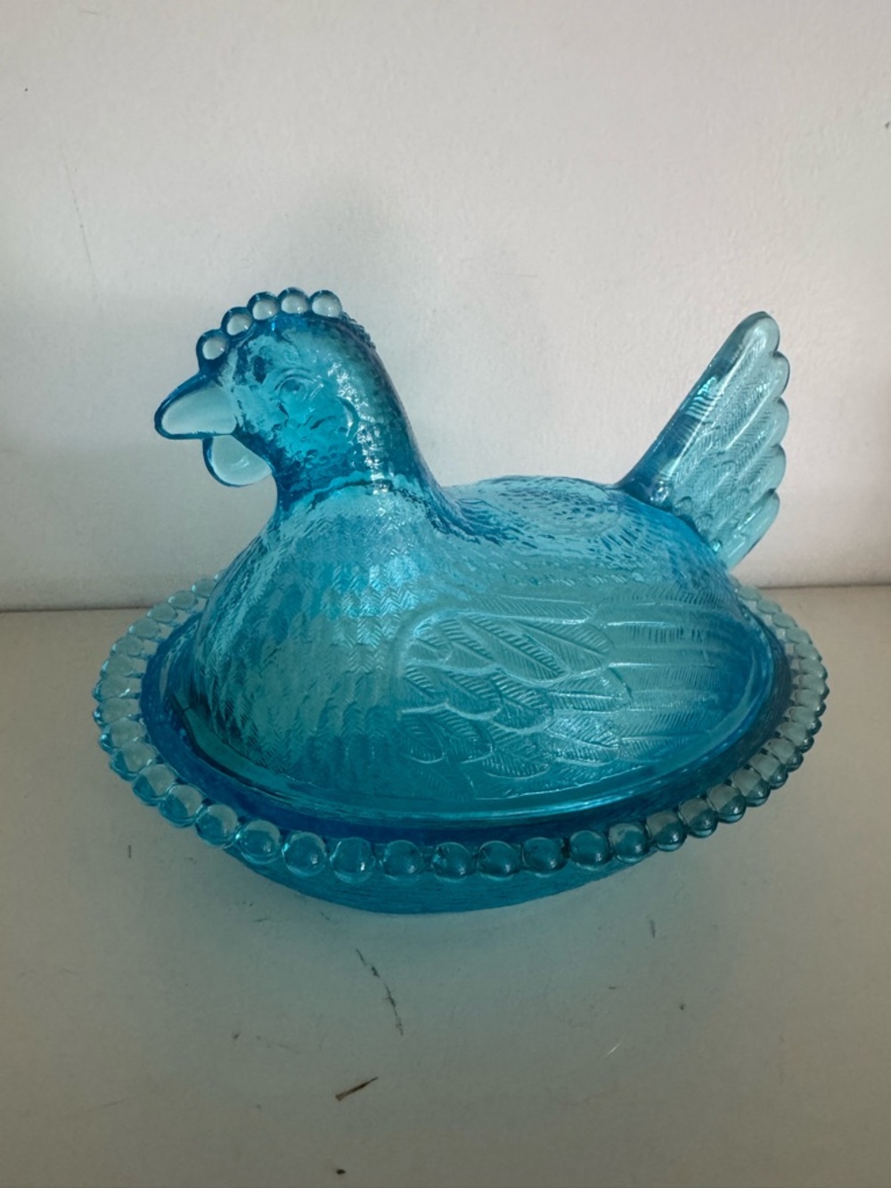 Indian Glass horizon Blue Hen on Nest covered dish with beaded edge pattern